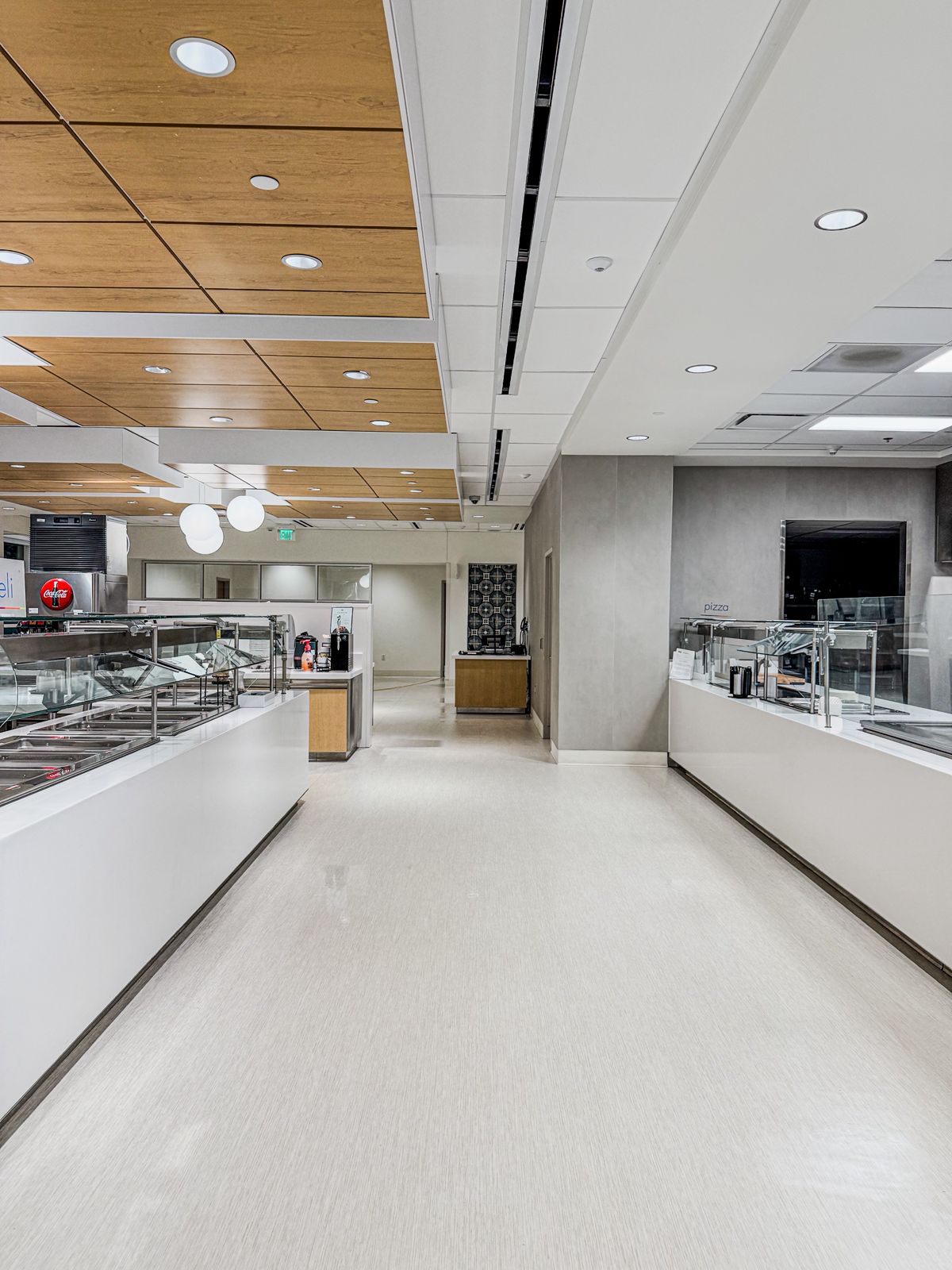 Clean commercial cafeteria floor after service